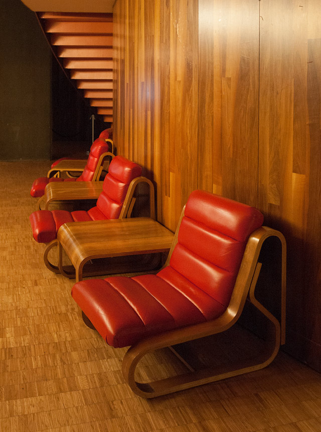 Red leather chairs standing in the hall of the Czech Embassy.