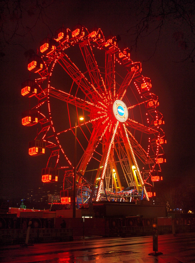 Bright red ferris wheel at the Red City Hall in Berlin.