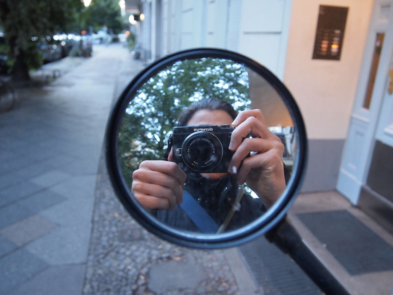 Self portrait of Berlin based street photographer Pam Schäfer.